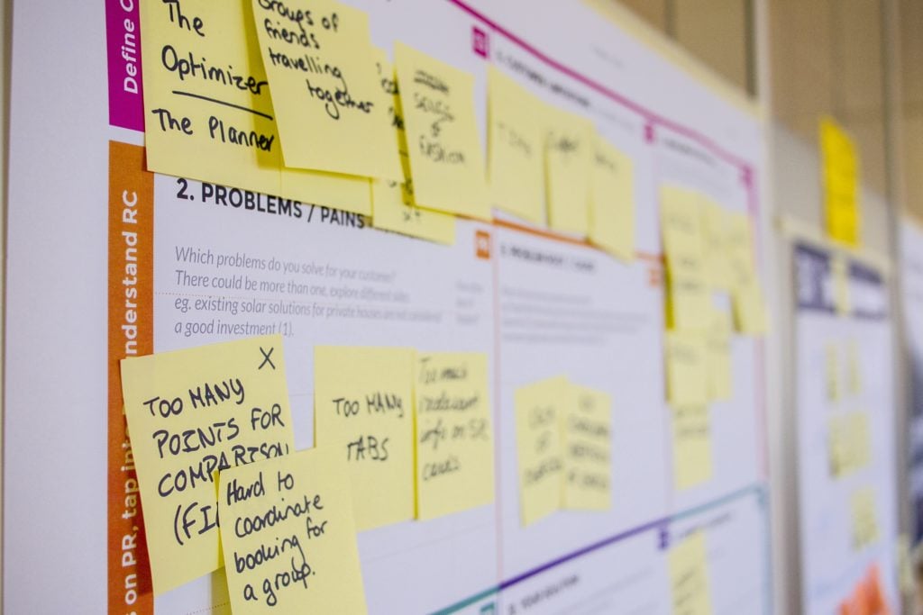 Yellow post-its with text on calendar